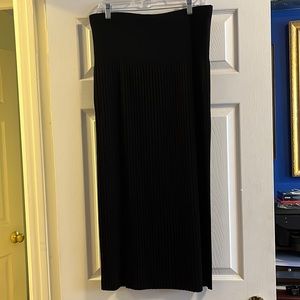 Black angle length knit skirt.